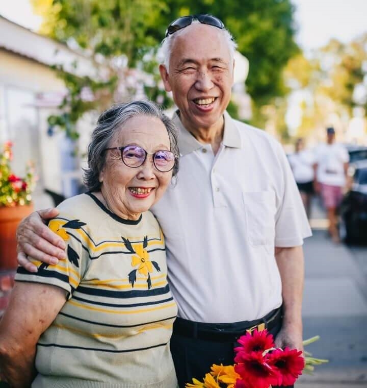 Happy retirees couple smiling