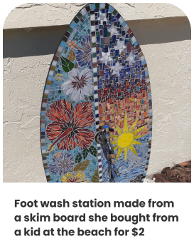 Foot wash station made from  a skim board she bought from a kid at the beach for $2